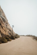 Misty Path Around Morro Rock Volcanic Formation California Monochrome Nature Background