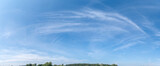 Fototapeta Fototapeta z niebem - niebo, krajobraz, błękit, niebieski, niebiesko, chmura, chmury, natura, lato, drzewa, wieś, wioska, obszary wiejskie, pole, trawa, zieleń, agrokultura, las, horyzont