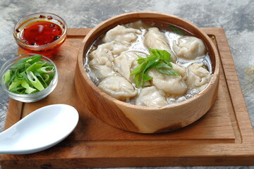 Wall Mural - delicious of wonton soup with chili oil and green onion,chinese food,asian food style