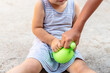 Little gir playing with anti stress sensory ball squeeze toy. Giant stress balls are soft to the touch and help reduce stress and anxiety as you pull, squish, smash, sensory toy