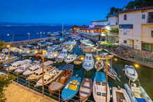 View Of Cafe And Restaurant Overlooking Harbour At Dusk, Lovran Village, Lovran, Kvarner Bay, Eastern Istria, Croatia