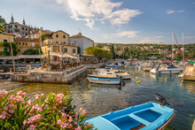 View Of Boats In The Marina And Harbourside Restaurants During Golden Hour In Volosko, Opatija, Kvarner Bay, Croatia