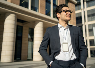 Wall Mural - An entrepreneur in a formal suit goes to the office to work