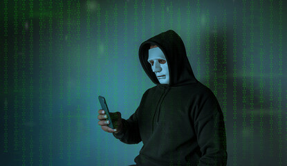 Wall Mural - Hood hackers are using mobile to attack sensitive data in credit card background binary code. Hacking and malware concept.