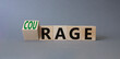 © Natallia - Courage and rage symbol. Turned wooden cubes with words Rage and Courage. Beautiful grey background. Business concept. Copy space.