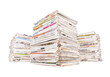 Three big stacks of generic newspapers isolated cut out