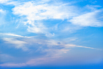 Wall Mural - Blue sky with white clouds. Beautiful cloudy sky. Skyward. Endless skyline. The sky at dawn.