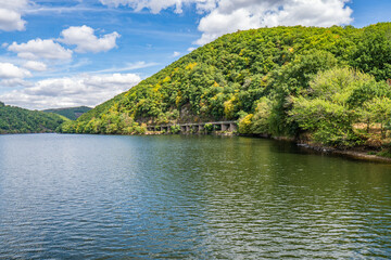 Wall Mural - Lake Rursee, In the middle of the Eifel National Park, surrounded by unique natural scenery and unspoilt nature