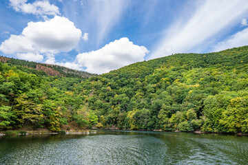 Wall Mural - Lake Rursee, In the middle of the Eifel National Park, surrounded by unique natural scenery and unspoilt nature