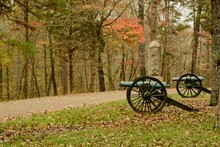 Two Civil War Era Cast Bronze Canons  Guard Roadway In Late Autumn Colors