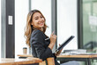 © Phushutter - Cheerful young pretty asian business woman using her touchpad at working desk in office workplace. Lets check my timetable!