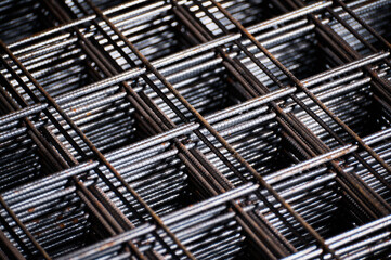 Stacked welded wire mesh in cold plant storehouse macro view