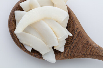 Wall Mural - Coconut chips in bowl, space for copy text.