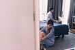 © tai - asian couple fight over failure relationship. young couple having a conflict disagreement about breakup. beautiful woman angry sitting near bed looking stressed sad depressed about marriage crisis