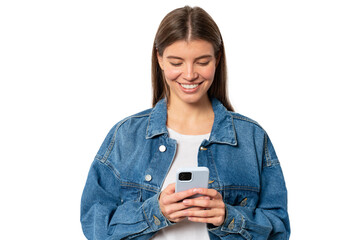 half length portrait of positive hipster girl holding smartphone in hands in stylish denim jacket