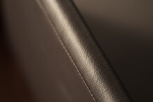 Closeup Shot Of Leather Armrest Of A Chair
