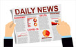 © mitay20 - Daily news. Business man hands close up of print newspaper with breaking news about coronavirus and global pandemic Covid-19.