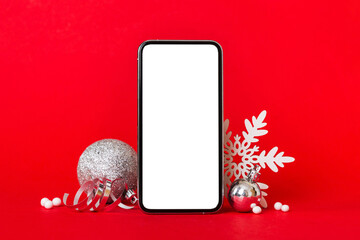 Wall Mural - Digital phone mock up with rustic Christmas decorations for app presentation with empty space for you design. Christmas online shopping concept. Tablet with copy space on colored background