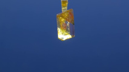 Sticker - Timelapse of the growth of a mineral crystal from a solution physic chemical experiment