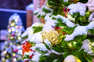 Wall Mural - Christmas toys in the snow on the tree.