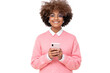 © Damir Khabirov - Smiling pretty african girl with afro hairstyle holding smartphone with both hands, looking at camera