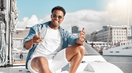 Champagne drink, yacht vacation and man on holiday in Miami, happy on a boat in the sun and international summer. Portrait of African person smile, excited and relax on luxury deck in the sunshine