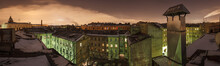Night Panorama Of Roofs And Courtyards Of St. Petersburg In Winter