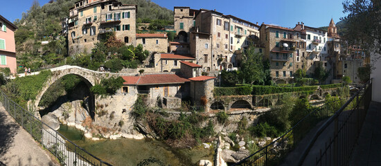 Wall Mural - Wide panorama of Rocchetta Nevina, a small ancient village of stone-made houses above the Ligurian Alps (Northern Italy), close to the borders between Italy and France.