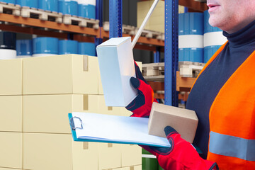 Wall Mural - Hands warehouse picker. Mans hands with clipboard boxes. Man works as picker. Warehouse worker picks orders. Guys hands in front racks. Warehouse picker career. Guy in orange vest and gloves