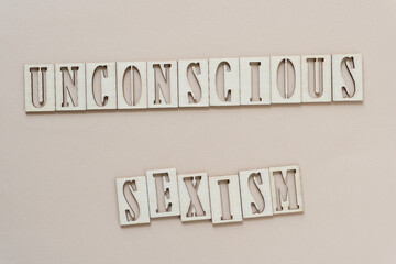 Poster - unconscious sexism - sign with wood type