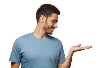 Wall Mural - young smiling man wearing casual blue t-shirt and demonstrating something on right with palm