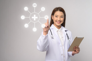 Portrait of female confident doctor over white background studio, healthcare and Medical technology concept.