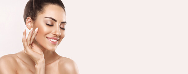 portrait of woman with beauty face and perfect skin on beige background. skin care. cosmetology, bea