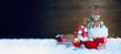 Santa Claus boot with toys and gift box in snow - Stuffed Santas shoe - Christmas background banner with copy space