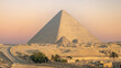 A view of the huge pyramid of Cheops, Giza, Egypt at sunrise.	