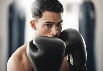 Poster - Fitness portrait of man boxer ready to punch during mma, boxing or fighting workout. Athlete boxing in the gym during training, exercise or practice for a fight, match or competition at a sport club