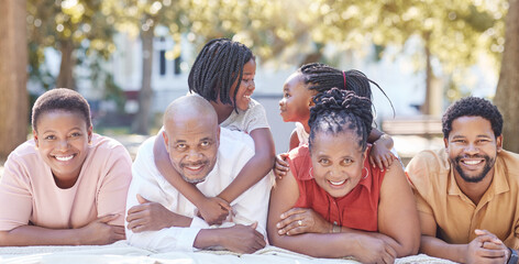 Wall Mural - Nature, garden and portrait of a happy black family relaxing together while on summer vacation. Smile, park and positive african people on a picnic outside while on a holiday in the countryside.