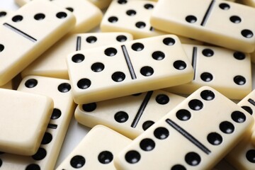 Canvas Print - Set of classic domino tiles on white background, closeup