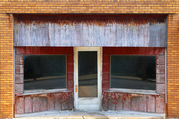 Wall Mural - store town rural shop closed abandoned shut empty closer recession despair brick door entrance sidewalk absent boarded business