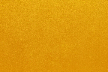 Wall Mural - Gold or yellow paint on cement wall texture  background.