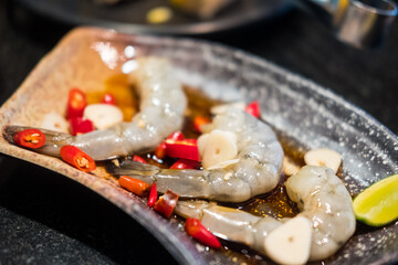 Wall Mural - Korean style pickled shrimps (Saewoo-Jang), marinate raw shrimps with chili, garlic and soy sauce