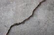 Deep Settling Crack in Concrete Sidewalk