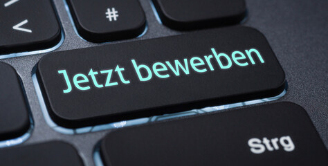 Wall Mural - beleuchtete tastatur mit einer beschrifteten taste - jetzt bewerben