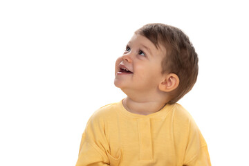 Wall Mural - Pensive happy baby looking up