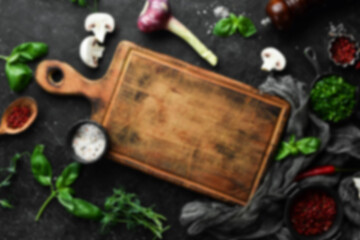 Wall Mural - Defocused food background. Set of organic food, spices and herbs. Top view. Free space for your text.