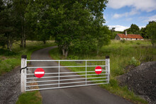 UK, Scotland, Closed Gate On Country Road