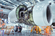 Large Aircraft Jet Engine In Aircraft Maintenance Hangar