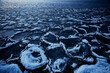 freezing sea ice round pieces, ocean background winter climate coast