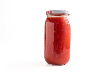 tomato sauce in jar, isolated on white background