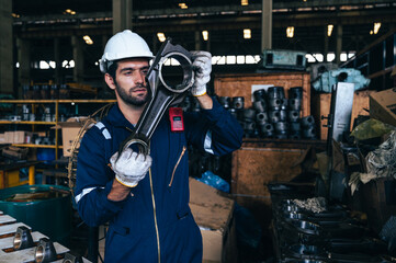 Wall Mural - the technician repairing and inspecting the big diesel engine in the train garage 